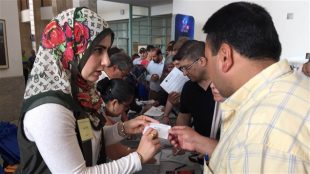 foire-emplois-refugies-syriens_sn635