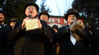 Inner Circle member Jeff Lundy reads Phil’s forecast for six more weeks of winter on Groundhog Day in Punxsutawney