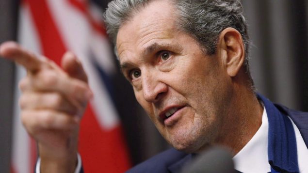 رئيس حكومة مانيتوبا بريان باليستر يهدد بملاحقة صحيفة/Canadian Press/JOHN WOOD