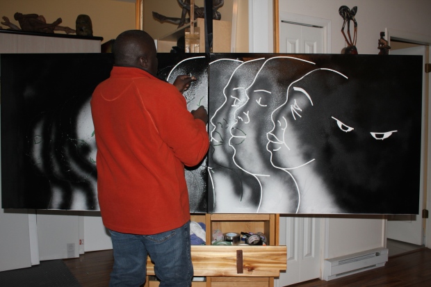 Artist Floyd Sandiford works on one of the paintings that will be included in the installation. (Shahanah Shivji)