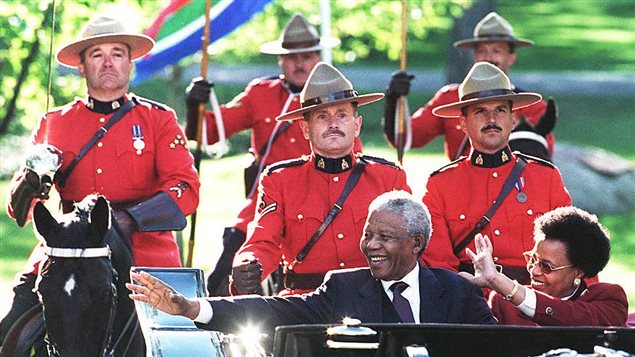 AFP_131205_dc45n_mandela-ottawa_sn635