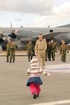 Returning soldier is greeted by his daughter. (Corporal Pamela Evans, Canadian Forces)