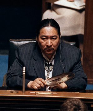 NDP MLA Elijah Harper sits in the Manitoba legislature holding an eagle feather for spiritual strength as he continues to delay the house debate on the Meech Lake accord in Winnipeg, June 19, 1990.