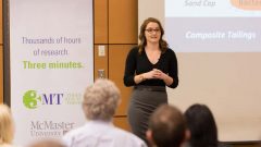 2014 McMaster University 3MT® Champion, Michelle Ried, explains her research on the oil sands to a crowd at the University competition leading up to the Ontario Provincial Championships. Photo McMaster University (CLICK to ENLARGE