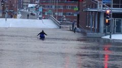 In Sherbrooke Quebec, many roads are closed, and hundreds have been evacuated as rain, and a sudden hot spell earlier caused the St Francois river to rise 7.5 metres (photo-Alison Brunette-CBC) CLICK to ENLARGE