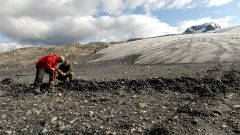 Matt Beedle and professor Menounos examine a moraine left behind by the melting Castle Creek glacier. (photo UNBC) CLICK to enlarge