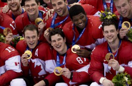 The victorious men's hockey team went through the Olympics undefeated. THE CANADIAN PRESS/Paul Chiasson