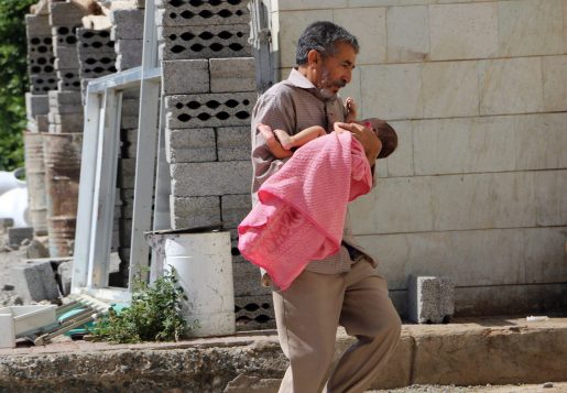 A child who was injured in clashes between tribal fighters and Shiite rebels known as Houthis is brought to a hospital by her father, in Taiz, Yemen, Sunday, Oct. 25, 2015. Yemen's fighting pits the Houthis and allied army units against forces loyal to the internationally recognized government as well as southern separatists and other militants. The U.N. says at least 2,577 civilians were killed since the Saudi-led air campaign began in March, while 5,078 have been injured. (AP Photo/Abdulnasser Alseddik)