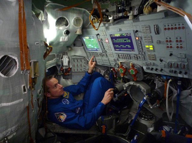 It's a snug fit for David Saint-Jacques in the Soyuz simulator during a training session in Star City, Russia. (Credit: Canadian Space Agency)