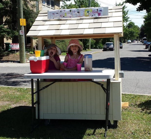 Adela Andrews (left) and her sister Eliza (right) were told to stop selling lemonade along Colonel By Drive. Photo: Courtesy of Kurtis Andrews