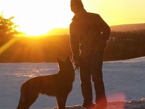 Calvin Kuchta with his dog, Arik