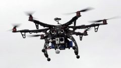 a photo of a larger commercial type drone with camera