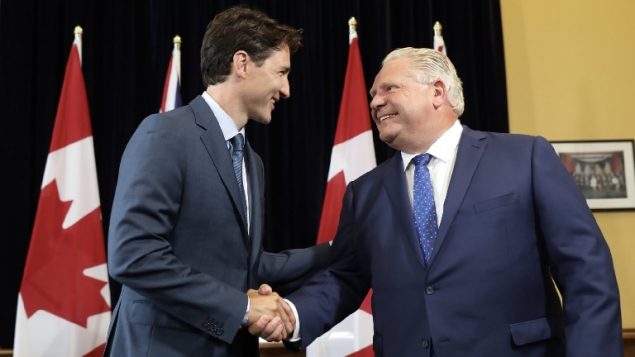 All smiles for the cameras as Prime Minister Trudeau travelled to Toronto to meet the newly installed Ontario Premier Doug Ford