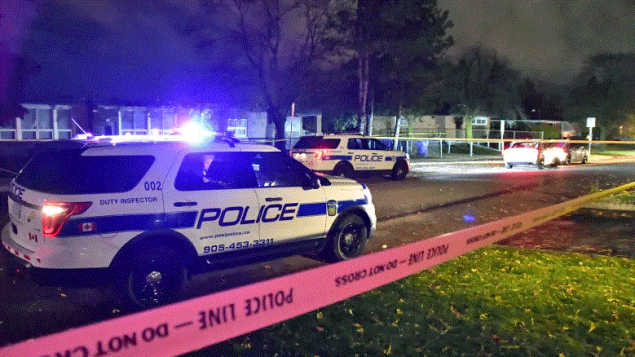 Peel Regional Police cars at the crime scene following a fatal shooting in Brampton