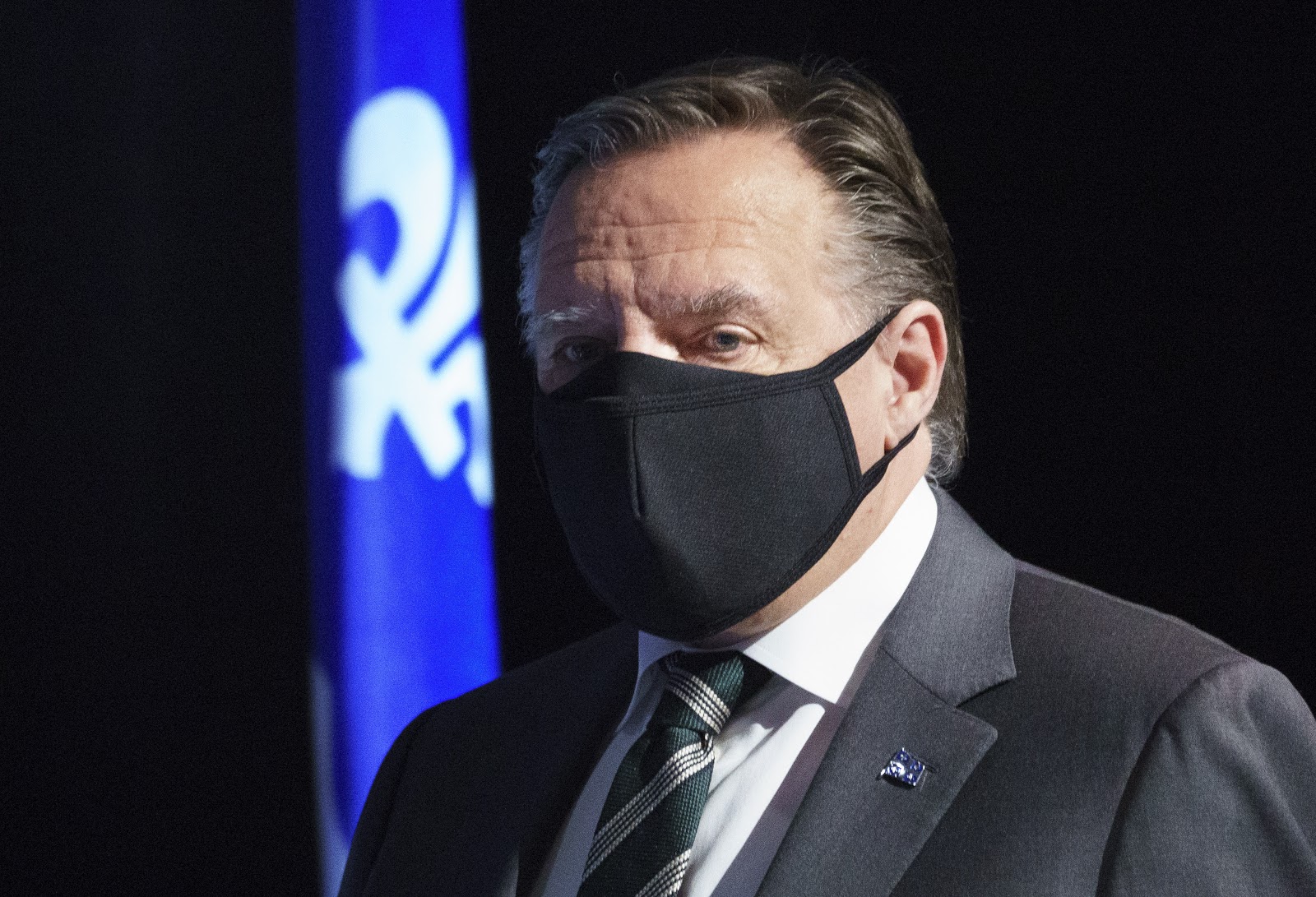 Quebec mandating masks in enclosed public spaces starting this weekend