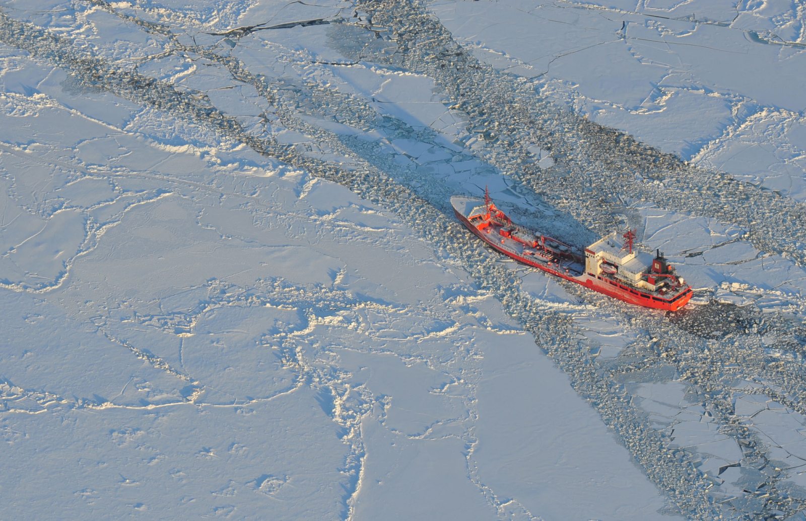 The Russian-flagged tanker Renda, carrying more than 1.3 million gallons of fuel to be delivered to Nome, Alaska, makes way through the Bering Sea ice 165 miles from the city on Jan. 8, 2012. Photo by Petty Officer 3rd Class Jonathan Lally. Alaska Dispatch. 