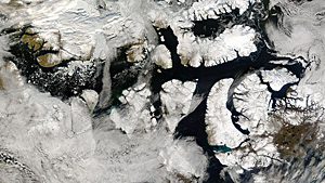 An ice-free Northwest Passage is seen in this handout satellite photo. Low ice levels are spurring dreams of commercial shipping in the region. (NASA) An ice-free Northwest Passage is seen in this handout satellite photo. Low ice levels are spurring dreams of commercial shipping in the region. (NASA)