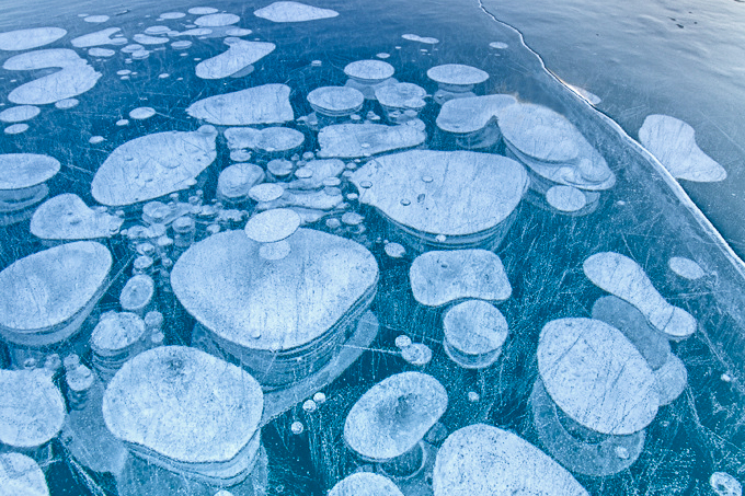 Biologically-produced methane is trapped in lake ice in Abraham Lake, Alberta. A related process is occurring in the Arctic Ocean, according to a recent NASA study. Fikret Onal / Flickr photo. Alaska Dispatch. 
