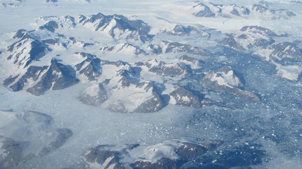An aerial shot shows glaciers along the east coast of Greenland. A new study finds Greenland's ice sheet is melting at a rate five times faster than just two decades ago. (Larry Gitnick/CBC)