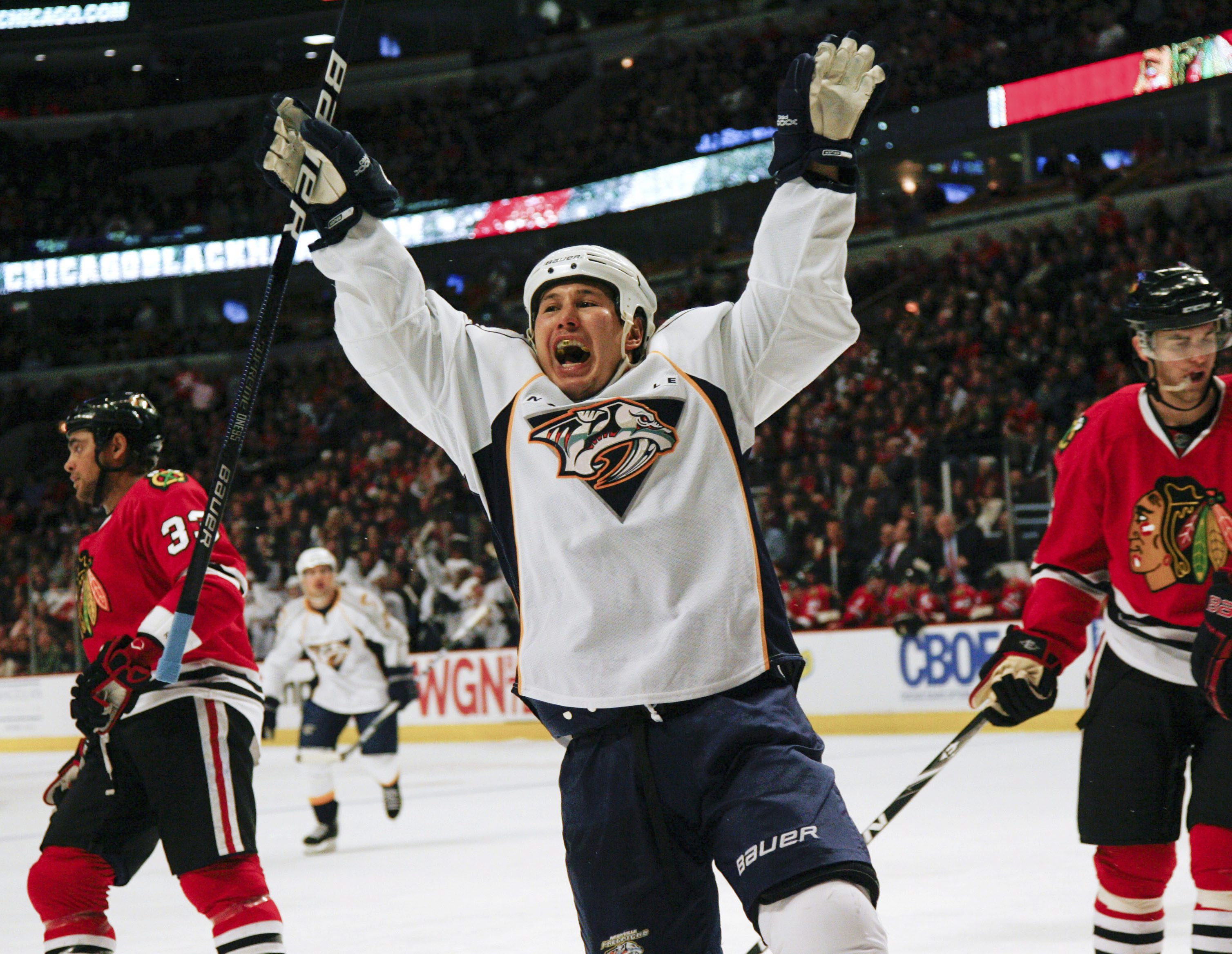 Jordin Tootoo celebrates goal while playing for the Nashville Predators on Friday, Dec. 4, 2009. Photo: Charles Cherney, AP Photo.  