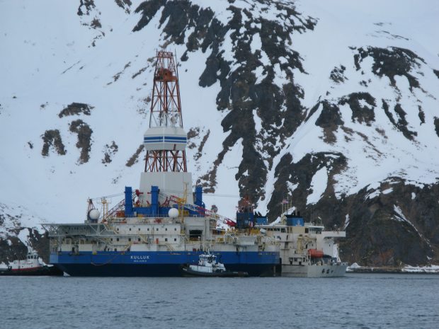 The conical drill rig Kulluk was loaded onto the Chinese heavy-lift vessel Xiang Rui Kou in Captain's Bay, Unalaska on March 19, 2013. (Jim Paulin. Alaska Dispatch)