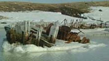 The wreck of the Maud, a ship that once belonged to Norwegian explorer Roald Amundsen, sits partially submerged in the waters near Cambridge Bay, Nunavut. A Norwegian group wants to bring the wreck to Amundsen's home country. Image CBC.