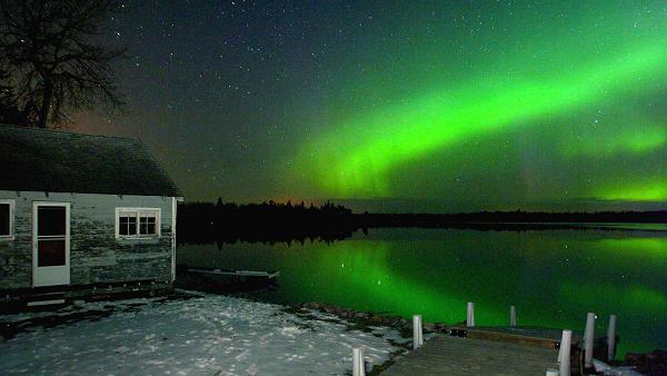 The northern lights over the Winnipeg River at Otter Falls, Manitoba in Whiteshell Provincial Park. Starting Thursday, astronauts aboard the International Space Station will photograph northern lights and beam the images back to Earth. Photo: Boris Minkevich, Winnipeg Free Press, The Canadian Press.