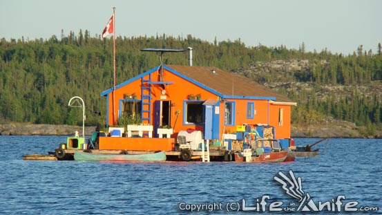 Orange_houseboat_in_summer