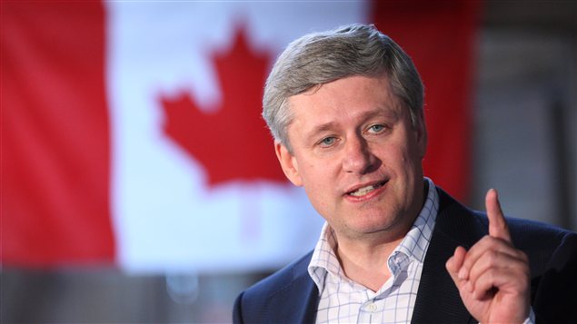   Prime Minister Stephen Harper delivered a speech in Caribou Crossing during his annual summer tour in the North on Monday. (Adrian Wyld/Canadian Press) 