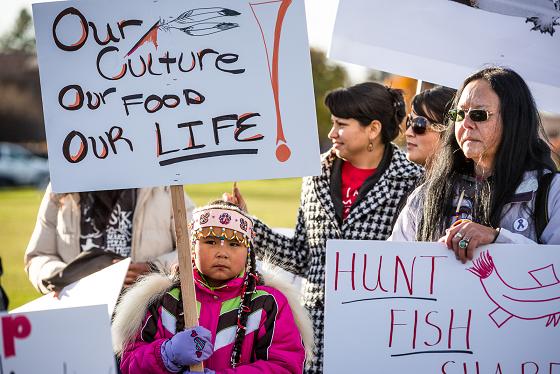 Wanda Medicine Wind Women Lane, 8, and her mother Charlene Lane, both from Gambell, Alaska, rally for indigenous hunting and fishing rights at Delaney Park Strip. Photo: Loren Holmes. Alaska Dispatch. 