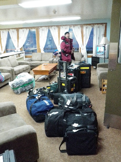 Luc, our cameraman, at Clyde River hotel with half of our gear.