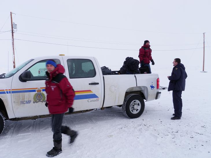 Luc and Jean help load gear into RCMP truck. Photo Eilis Quinn