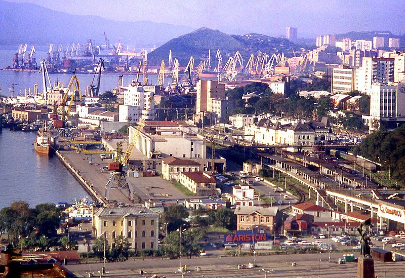 Vladivostok has many cranes and trains, illustrating its connections with the outside world.