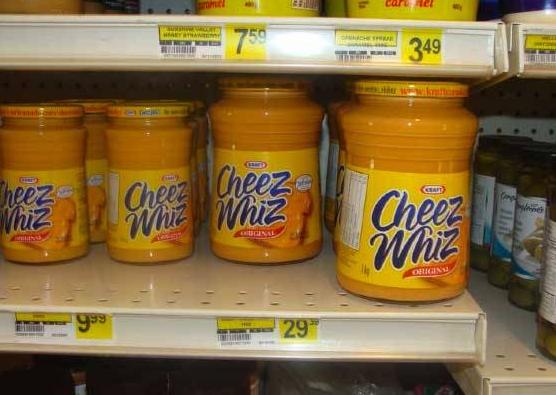 Processed cheese spread: $9.99 to $29.39 - The shelves at the Northern Store in Arctic Bay, Nunavut, in February 2011 show very high prices for things like processed cheese spread, infant formula and instant noodles. Nunavut MLA Ron Elliott, who represents Arctic Bay, says the prices of these items have risen in Nunavut's High Arctic communities since the federal government started changing its northern food subsidy program last year. Photo submitted by Ron Elliott.