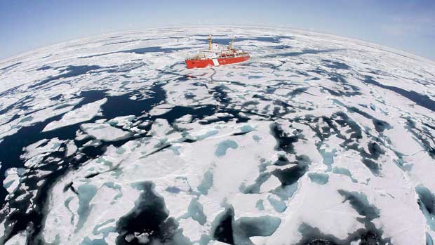 The Canadian Coast Guard icebreaker Louis S. St-Laurent makes its way through the ice in Baffin Bay in July 2008. Arctic waterways are increasingly becoming ice-free, opening them up to more marine traffic in recent years.