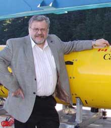 Jacob Verhoef, seen with an AUV deployed in the central High Arctic last year, says the ice floe where scientists set up their camp started breaking up. (DRDC Atlantic)