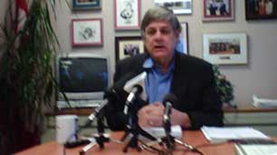 Yukon Liberal MP Larry Bagnell, a member of the Commons committee on aboriginal affairs and northern development, talks to reporters in Whitehorse on Friday about the committee's new report. (Leonard Linklater/CBC)
