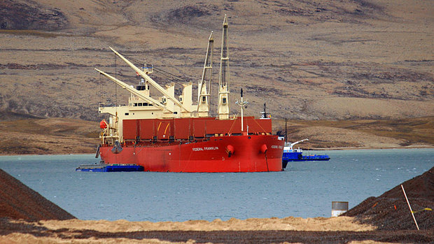 The Federal Franklin, a ship on longterm charter to Fednav, takes part in a bulk sample operation in Milne Inlet, on the north end of Baffin Island, in August 2008. Fednav carried about 130,000 tonnes of cargo to Europe as a sample shipment for Baffinland Iron Mines Corporation, which is proposing a massive open-pit iron mine at Mary River. (Fednav)