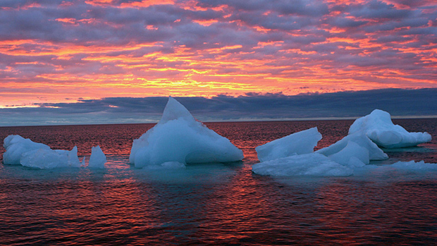 Ice floats in the Arctic Ocean as the sun sets near Barrow, Alaska. AP Photo/Arctic Sounder, Beth Ipsen