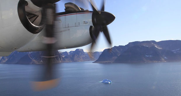 The National Aerial Surveillance Program's Dash 7 patrol aircraft flies over Hudson Strait on Tuesday. Observers aboard the aircraft scanned the Arctic waterway for ships and any sign of pollution, including oil spills. (Vincent Desrosiers, CBC)