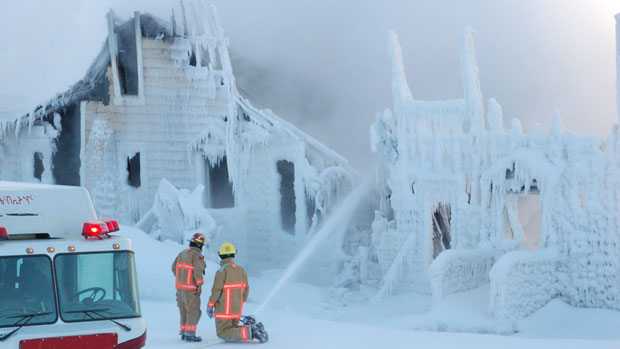 Dozens of people are homeless after a deadly fire at the White Row townhomes in Iqaluit on Sunday night. (Paul Moore/CBC)