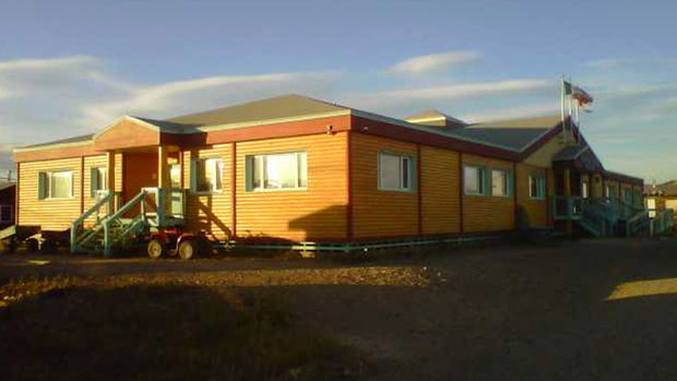 The Vuntut Gwitchin First Nation office in Old Crow, Yukon. Chief Joe Linklater says the snow won't be deep enough to build a proper winter road to the community this year. (Leonard Linklater/CBC )