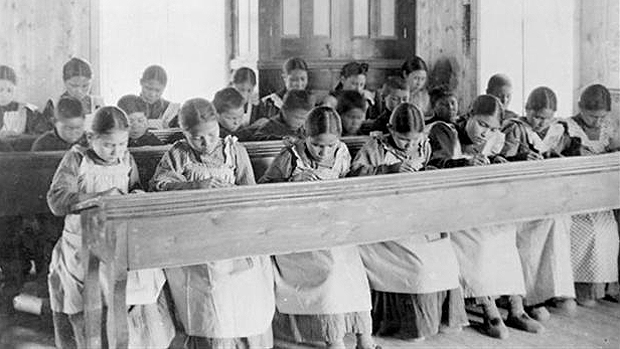 For much of the 19th and 20th centuries, aboriginal children in Canada were forced to attend government-funded, church-run residential schools, where they suffered emotional, physical and sometimes sexual abuse. (Library and Archives Canada)