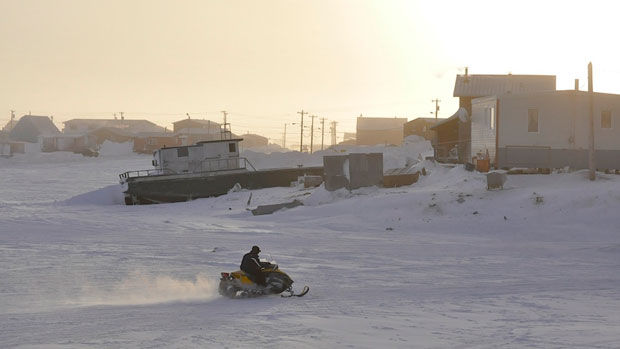 Residents of Tuktoyaktuk, N.W.T. say a man died after a vehicle crashed through the ice in the community’s harbour, pictured here in a 2011 photo. (Philippe Morin/CBC )