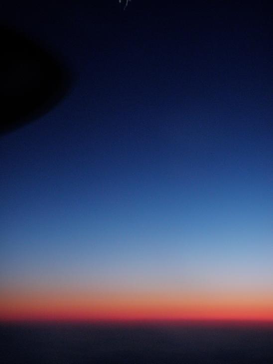 View from plane at night. Photo by Eilís Quinn.