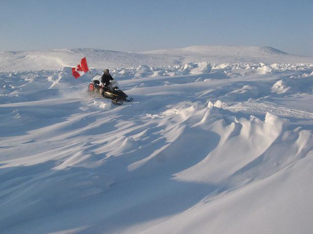 Ranger scout Samson Ejanqiaq looks for an easier route through rough sea ice that bedevilled a patrol of Canadian Rangers on their way from CFS Alert to the Eureka Weather Station March 28. Ejanqiaq eventually guided the soldiers along the shoreline, where they found easier going. Photo: Bob Weber. The Canadian Press.