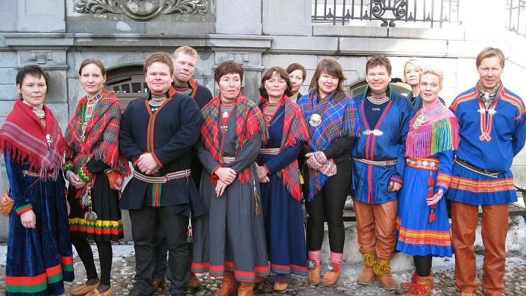 Sámi reindeer herders standing outside the High Court in Sotckholm. Photo: Sámi Radio