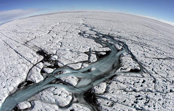 Aerial view of melting glaciers near Ilulissat, Greenland part of the Kingdom of Denmark. Photo: Michael Kappeler, Pool, AFP Photo.  