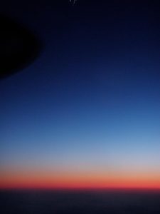 View from plane at night. Photo by Eilís Quinn.