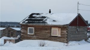 Tina Wrigley, whose home is pictured here, is one of the people in Deline who have had serious housing issues. Others have faced evictions for not being able to pay rent. (Hilary Bird/CBC)